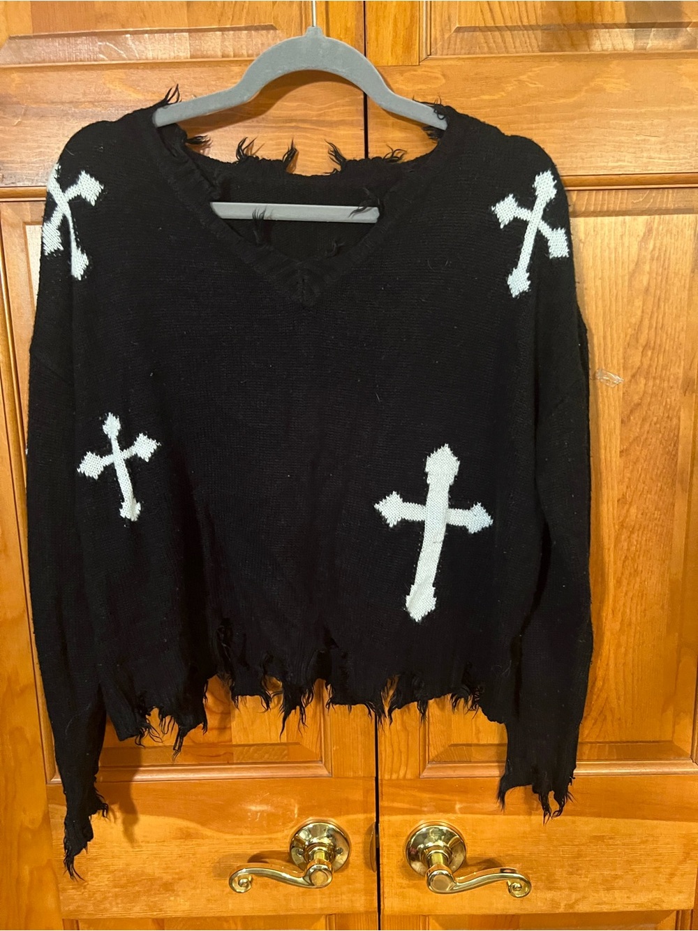 SHEIN Black V-Neck Distressed Sweater with White Cross Motifs
